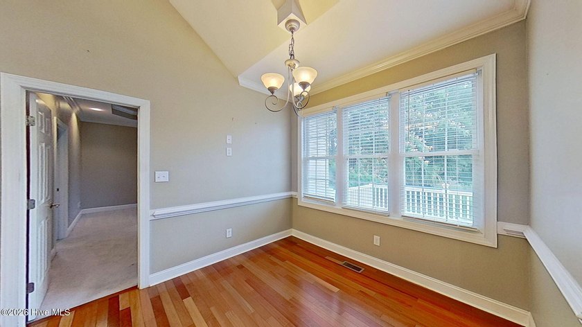 Discover refined coastal living in this beautifully maintained - photo 17