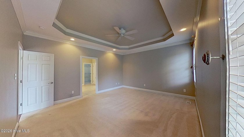 Discover refined coastal living in this beautifully maintained - photo 19