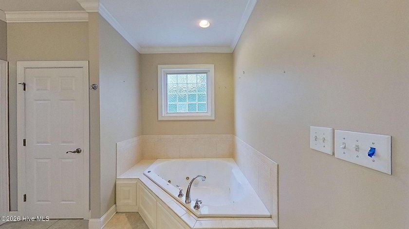 Discover refined coastal living in this beautifully maintained - photo 23