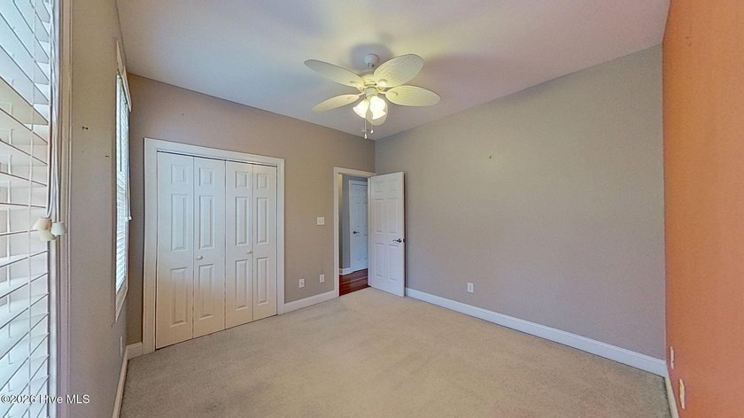 Discover refined coastal living in this beautifully maintained - photo 26