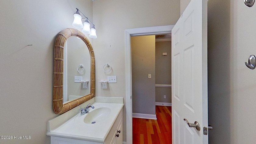 Discover refined coastal living in this beautifully maintained - photo 29