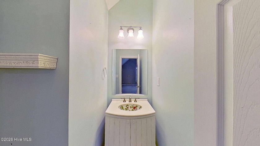 Discover refined coastal living in this beautifully maintained - photo 33