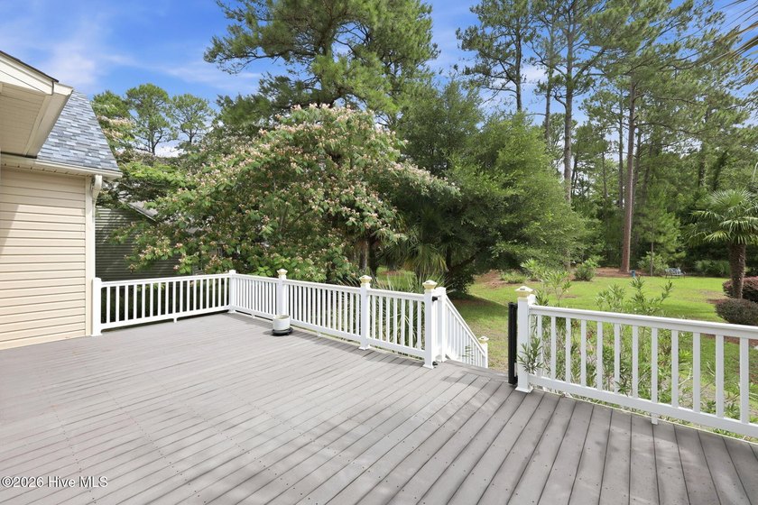 Discover refined coastal living in this beautifully maintained - photo 36