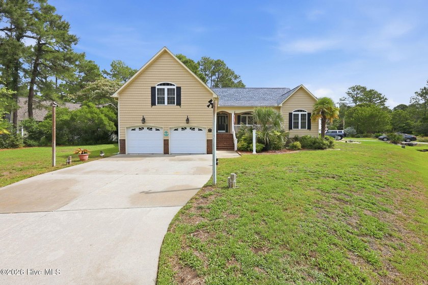 Discover refined coastal living in this beautifully maintained - photo 45