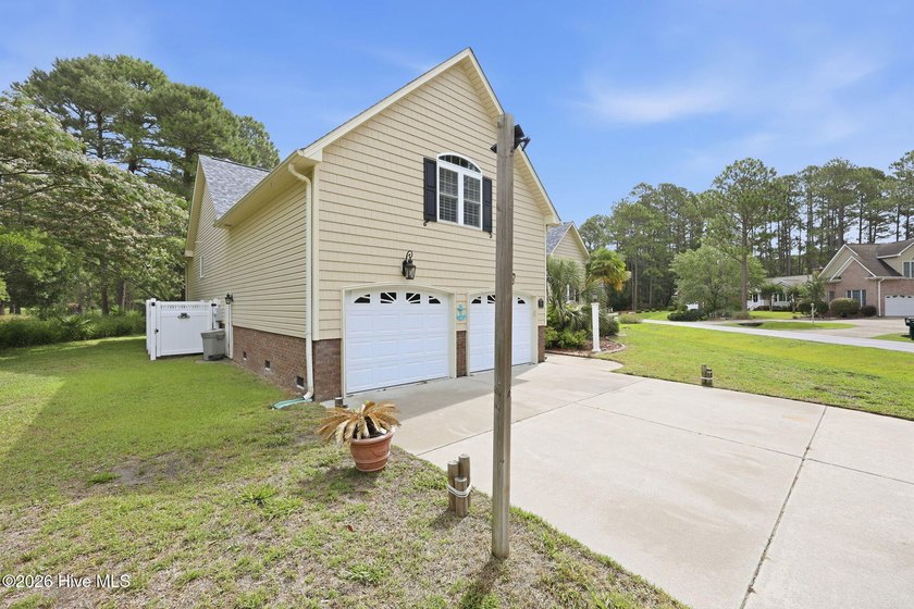 Discover refined coastal living in this beautifully maintained - photo 46