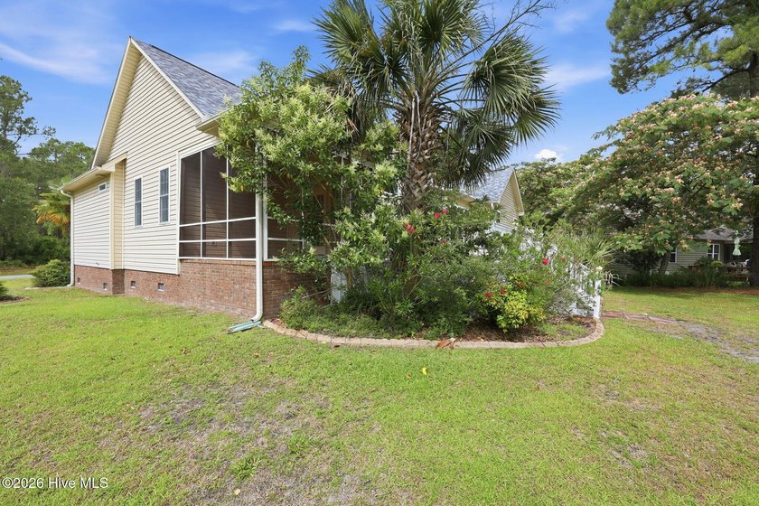 Discover refined coastal living in this beautifully maintained - photo 50
