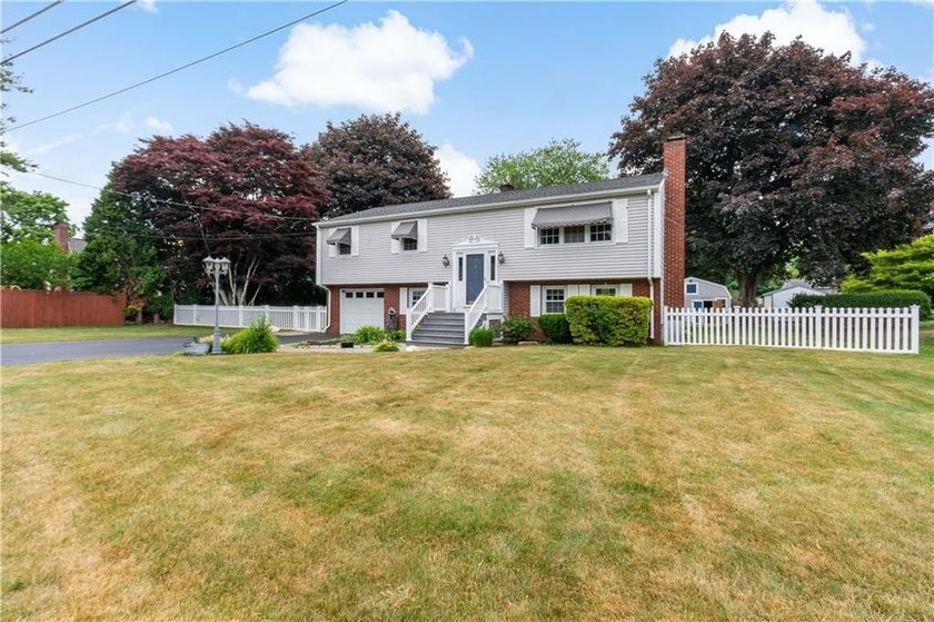 Discover the potential of this raised ranch located in the - photo 35