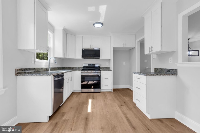 Beautifully renovated 3-bedroom, 2-full-bath home located in the - photo 11
