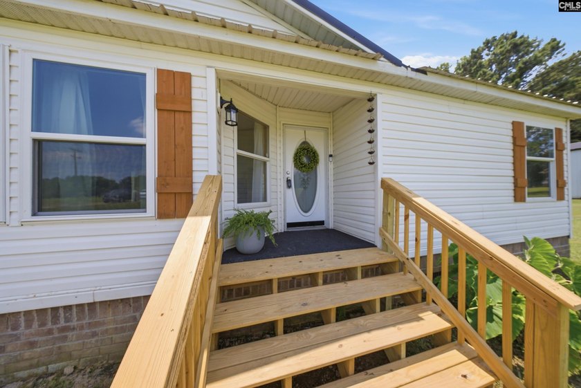Welcome to 7580 Columbia Highway-where modern updates meet - photo 4