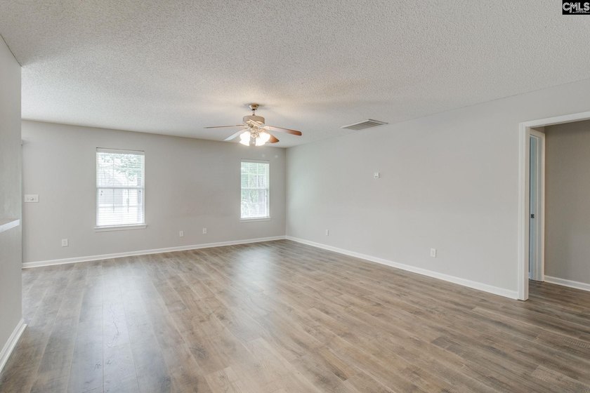 Welcome to this beautifully updated 5-bedroom, 3.5-bath home - photo 7