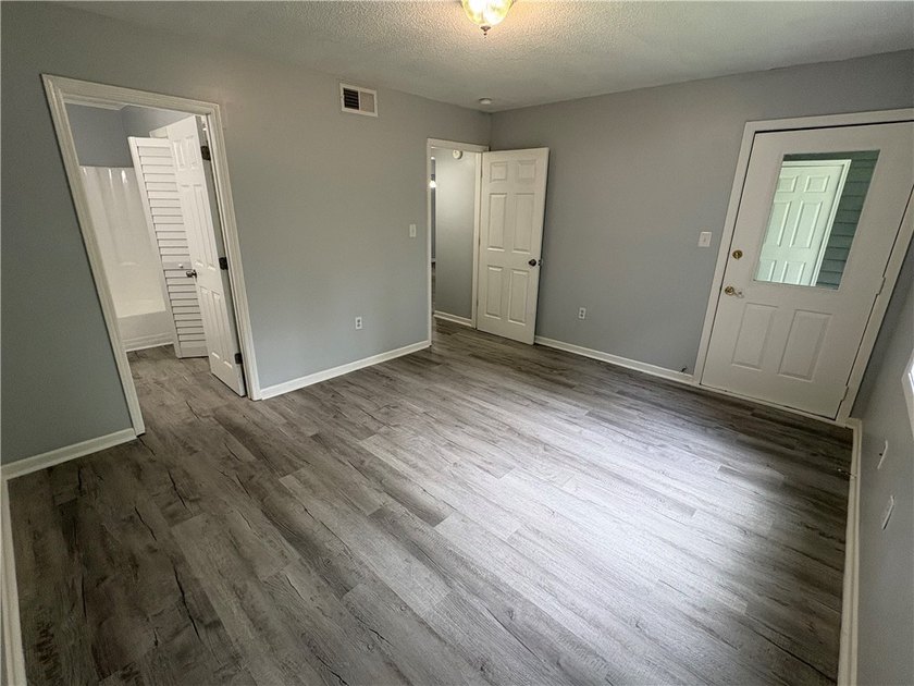 Discover a beautifully remodeled condominium offering a tranquil - photo 16