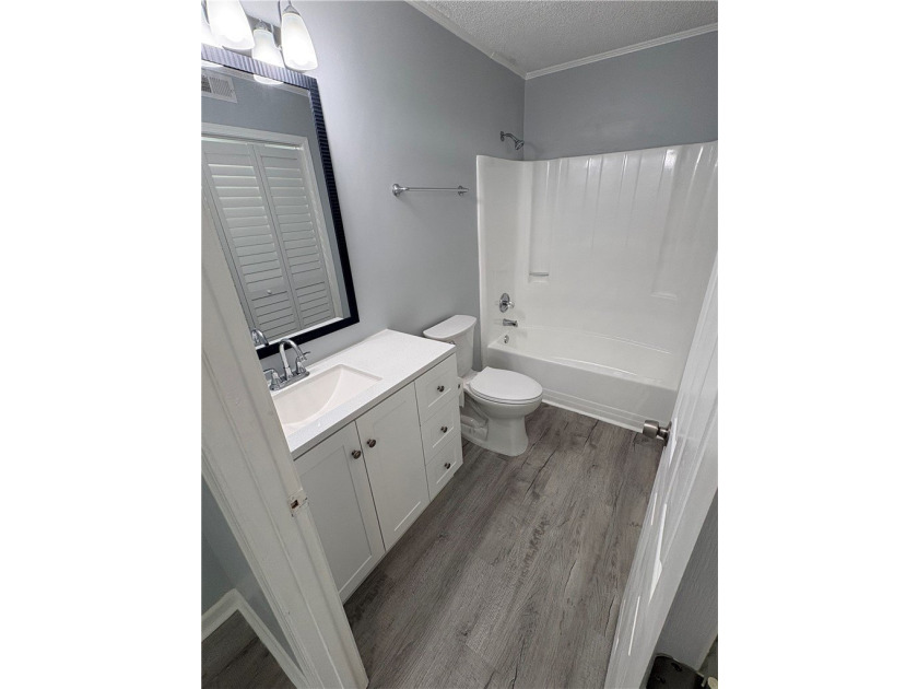 Discover a beautifully remodeled condominium offering a tranquil - photo 17