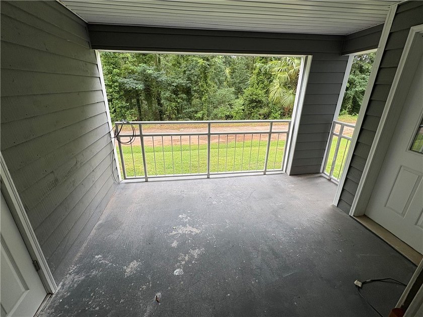 Discover a beautifully remodeled condominium offering a tranquil - photo 18