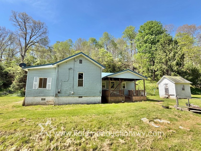 ***AUCTION***Price of $73,700 Reflects the County Appraised - photo 3