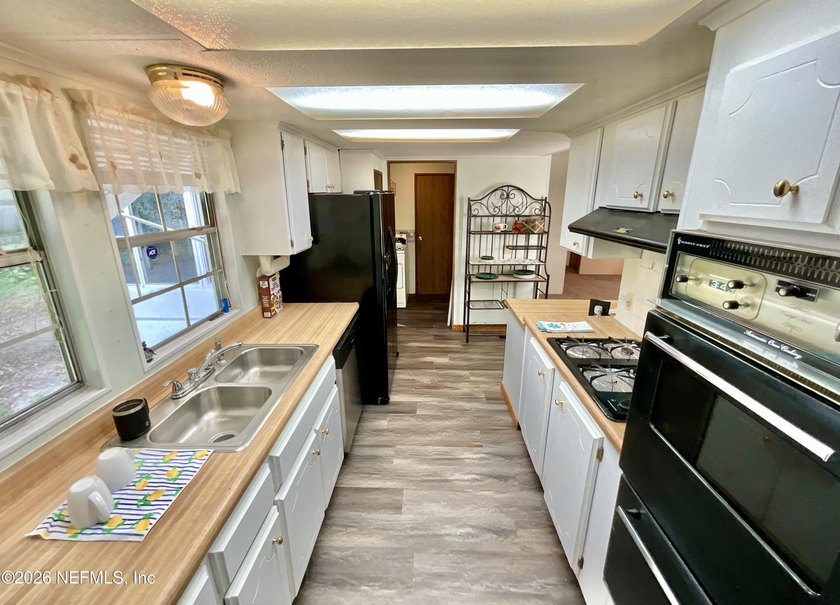 LAKE ACCESS with this very well kept and clean 3 BR , 2 bathroom - photo 14