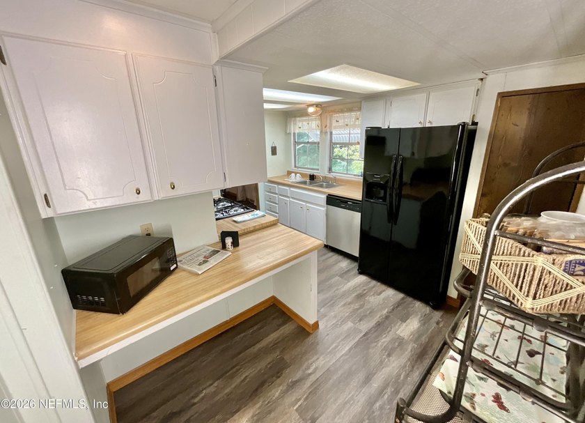 LAKE ACCESS with this very well kept and clean 3 BR , 2 bathroom - photo 15