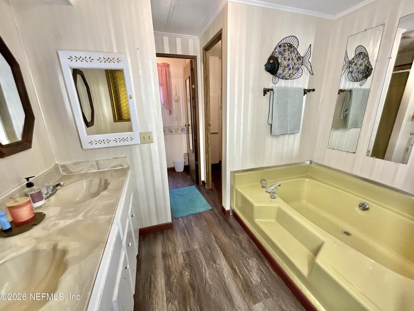 LAKE ACCESS with this very well kept and clean 3 BR , 2 bathroom - photo 25