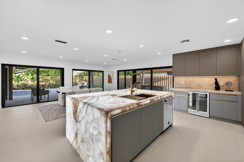 Exquisitely reimagined, this stunning 3-bedroom, 2-bath - photo 9