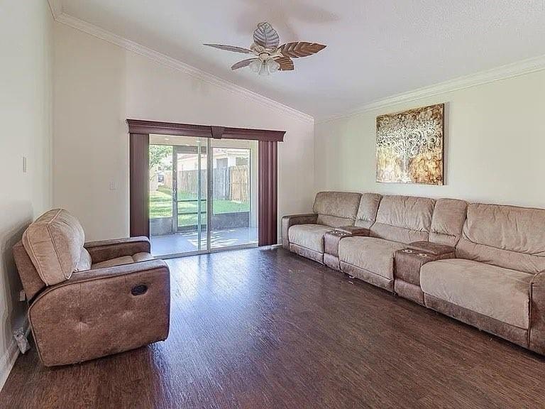 Step inside to a bright, 4BR 2 BA home enhanced by warm wood - photo 7
