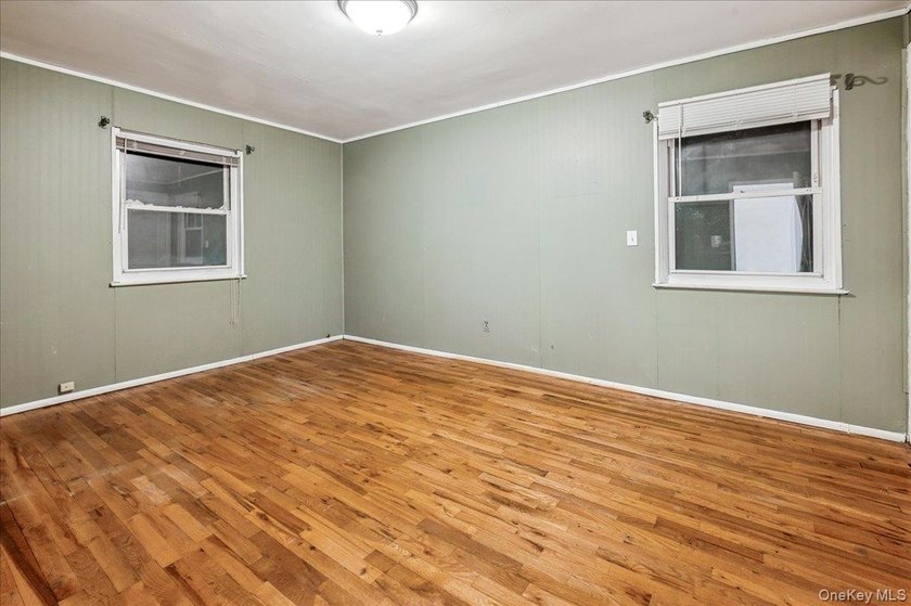 Welcome to 2125 Homer Avenue, a well maintained two-family brick - photo 8