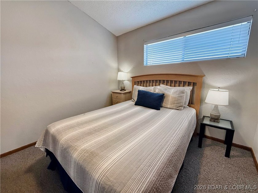 Enjoy lake living at its best in this beautifully maintained - photo 21