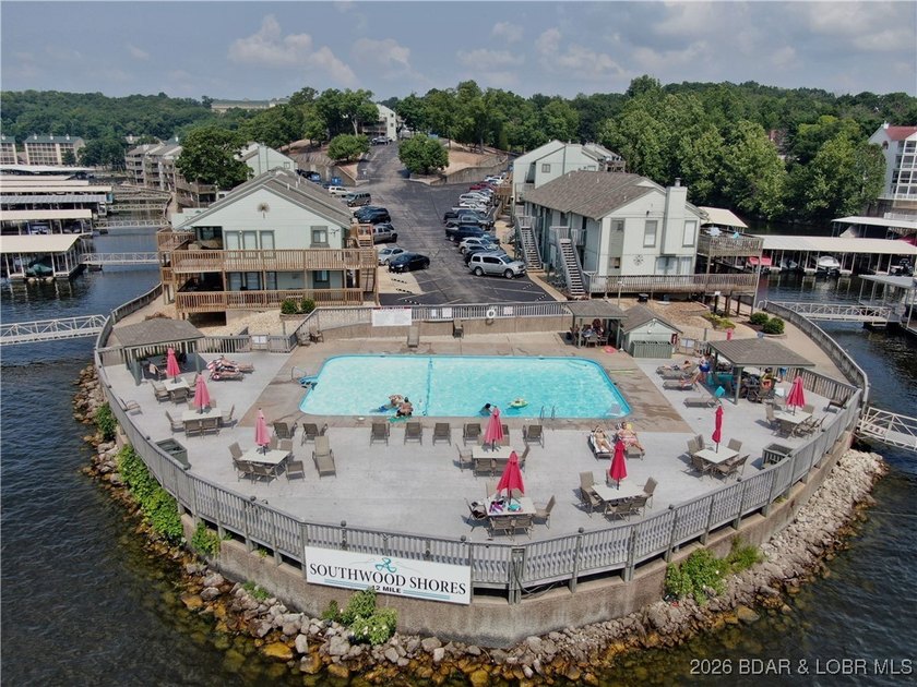 Enjoy lake living at its best in this beautifully maintained - photo 44