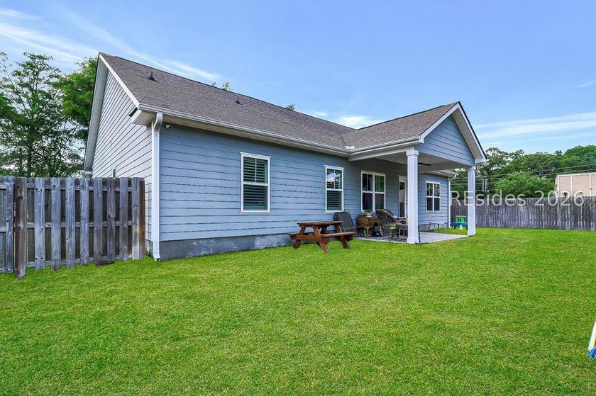 Enjoy this single level, 3BR/2BA open floor plan home on almost - photo 31