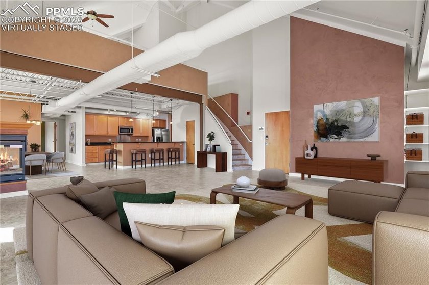 This rare penthouse corner residence in Poet Lofts, offers an - photo 6