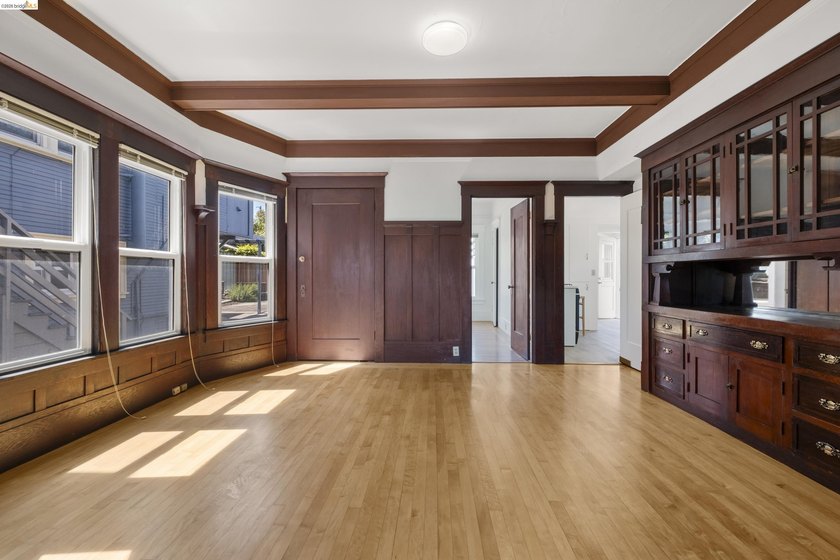 This beautifully preserved 1910 duplex blends timeless character - photo 9