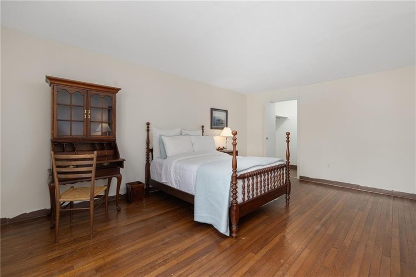 Overlooking the lush greenery and in-ground pool, this private - photo 41