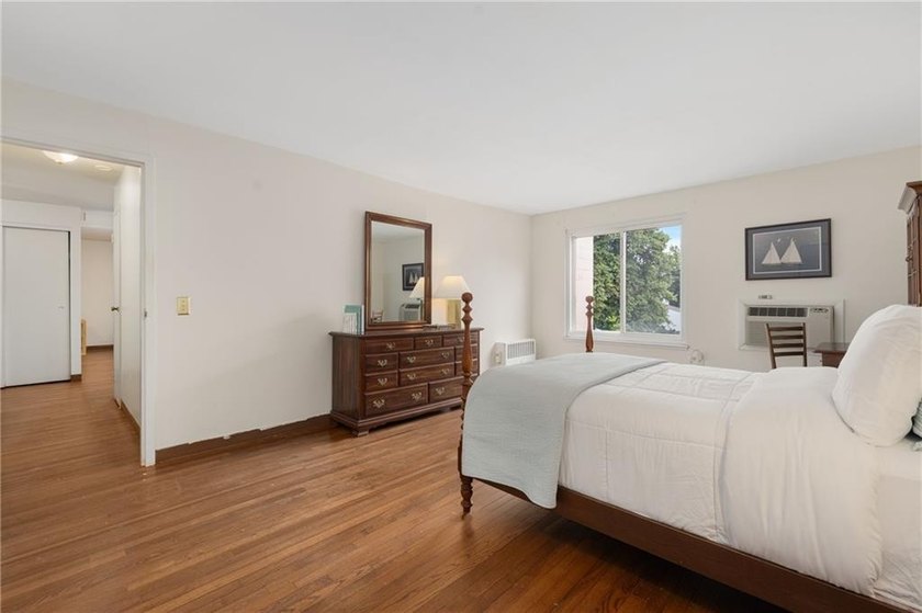 Overlooking the lush greenery and in-ground pool, this private - photo 43