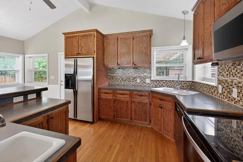 Located on a spacious corner lot, this waterfront 3-bedroom - photo 12