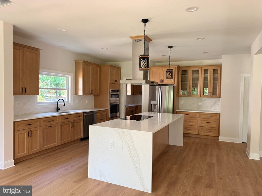 Nestled in the prestigious Lake of the Woods community, this - photo 11