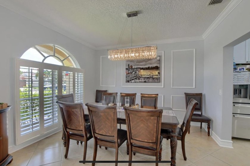 Welcome to this beautiful home located at 9460 Lake Serena Dr - photo 6