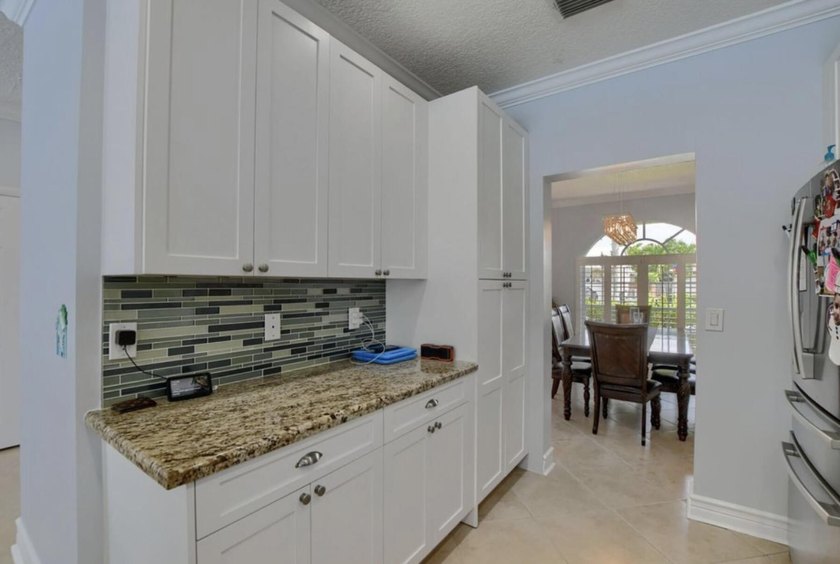 Welcome to this beautiful home located at 9460 Lake Serena Dr - photo 9