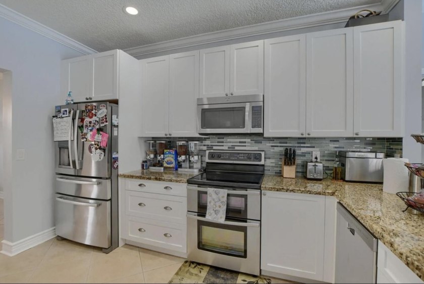 Welcome to this beautiful home located at 9460 Lake Serena Dr - photo 10