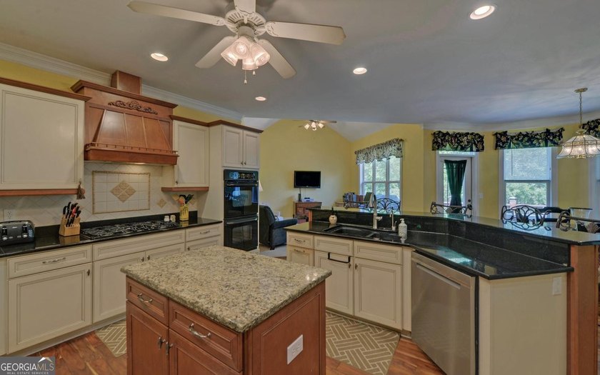 Custom-built lakefront home located within the city limits of - photo 9