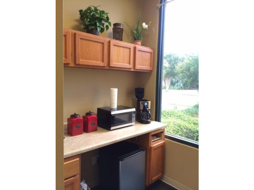 This office suite is on the first floor and features a - photo 8