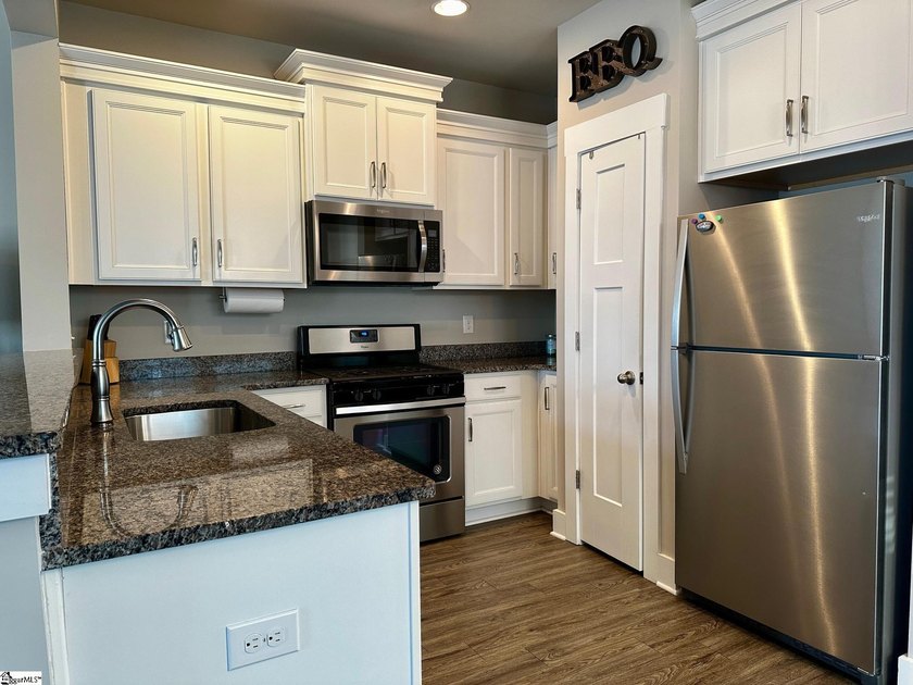 Welcome to 215 Meritage Drive, a beautifully designed townhome - photo 14