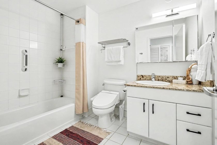 Experience modern city living at its finest in this sleek - photo 12