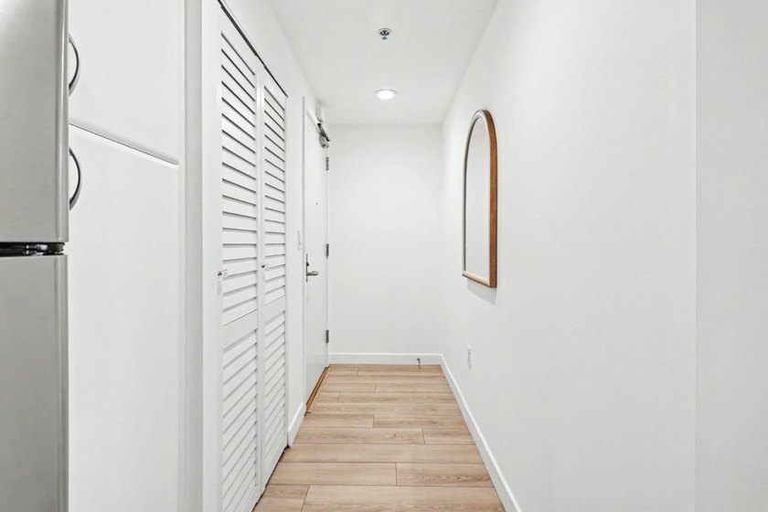 Experience modern city living at its finest in this sleek - photo 14