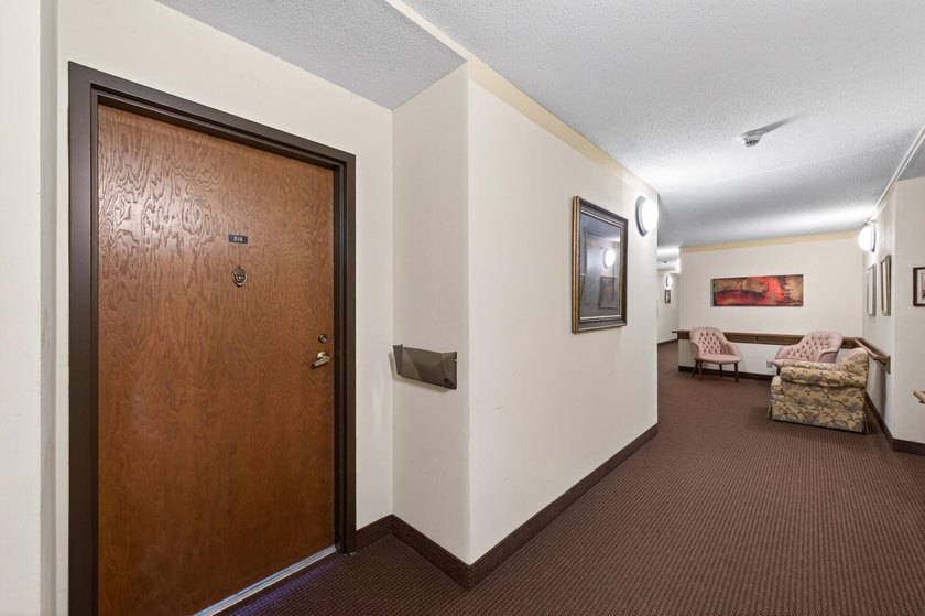 Amazing second floor unit with a private balcony overlooking a - photo 3