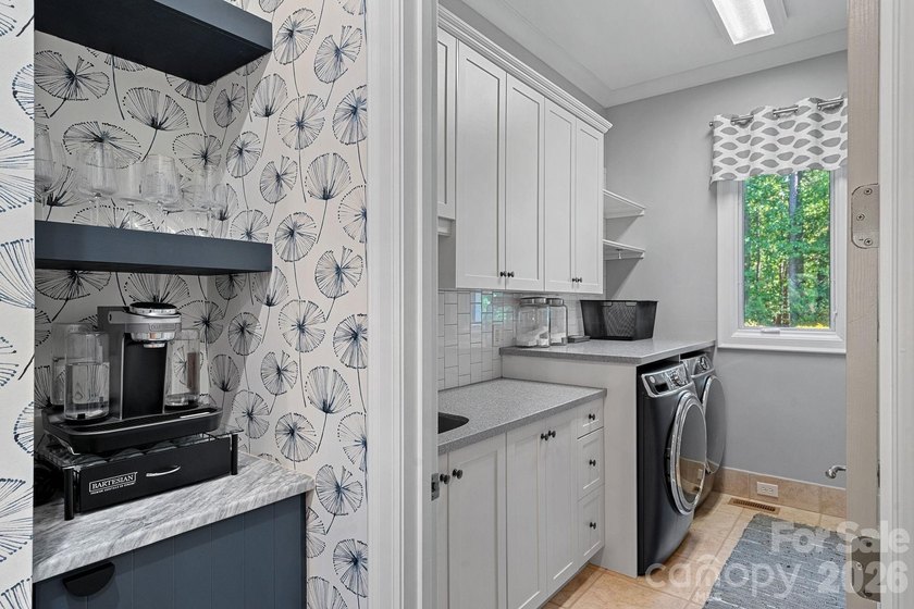 Set on a beautifully landscaped corner lot in a highly - photo 22