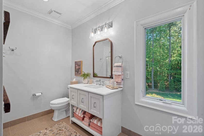 Set on a beautifully landscaped corner lot in a highly - photo 34