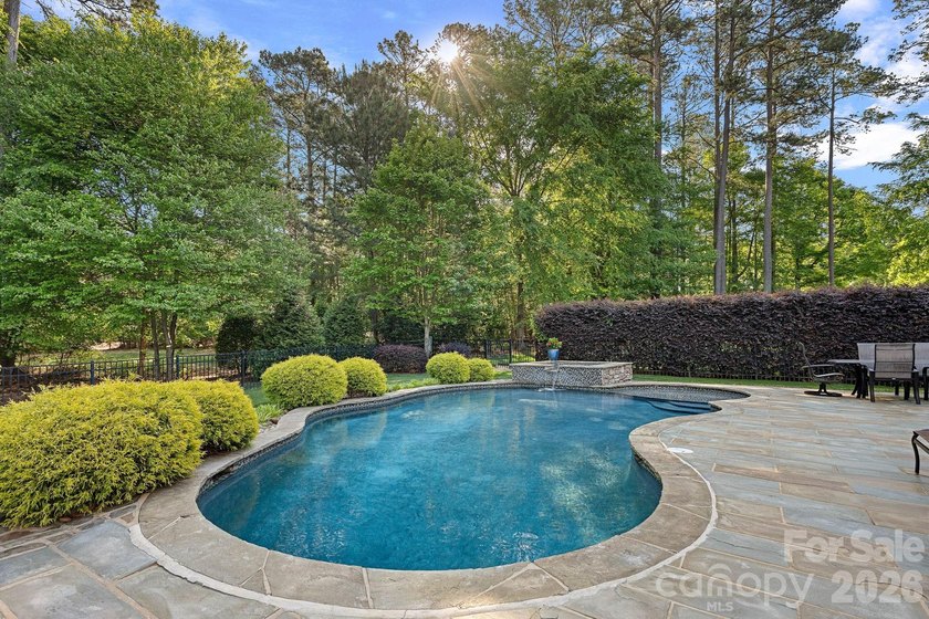 Set on a beautifully landscaped corner lot in a highly - photo 42
