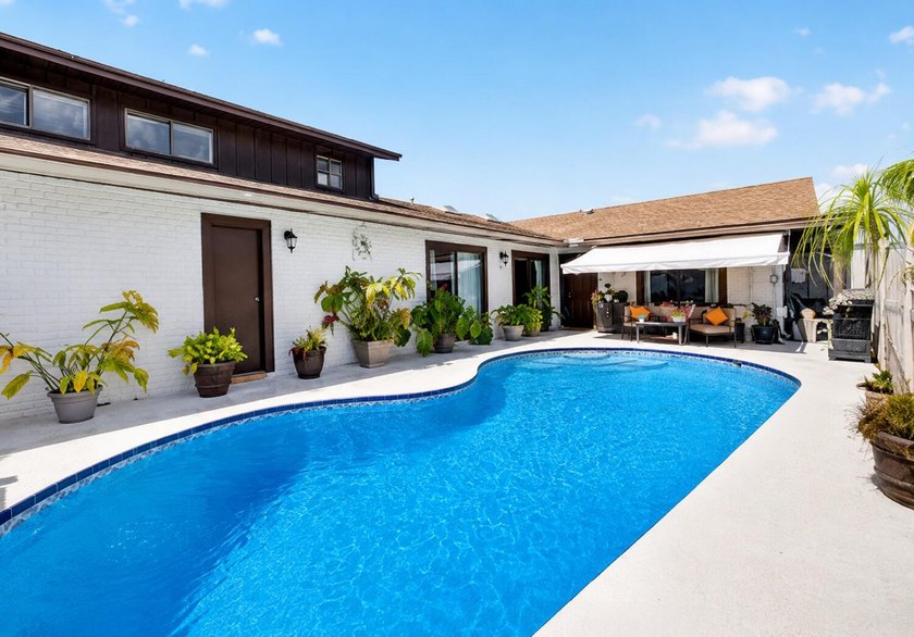 Rare opportunity to own a private pool home in Boca Gardens - photo 2