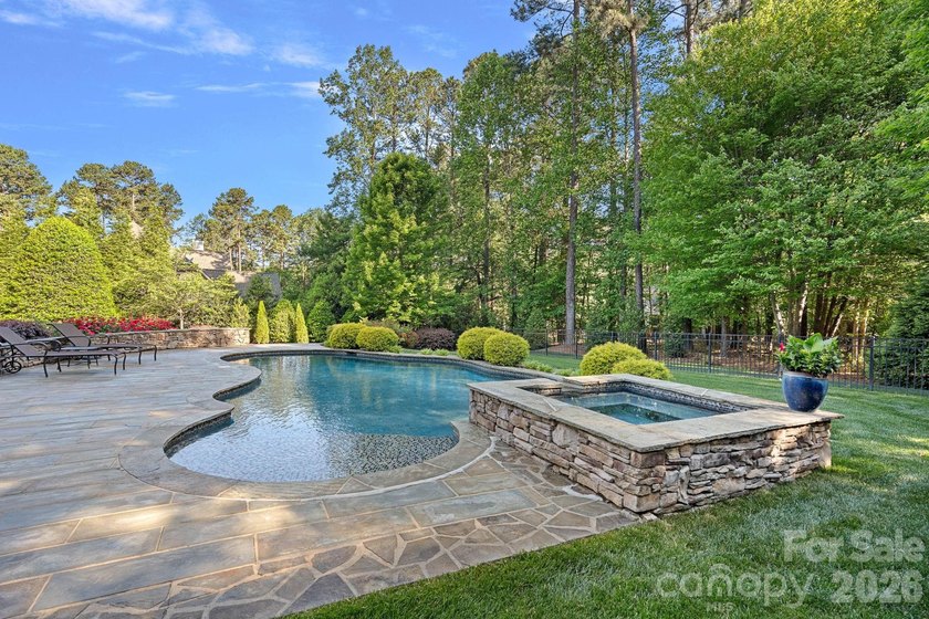 Set on a beautifully landscaped corner lot in a highly - photo 43