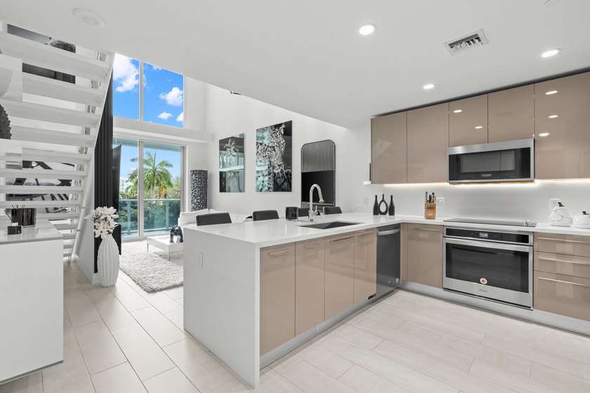 ABSOLUTELY GORGEOUS FULLY RENOVATED CONDO | PRESTIGOUS NEW - photo 8