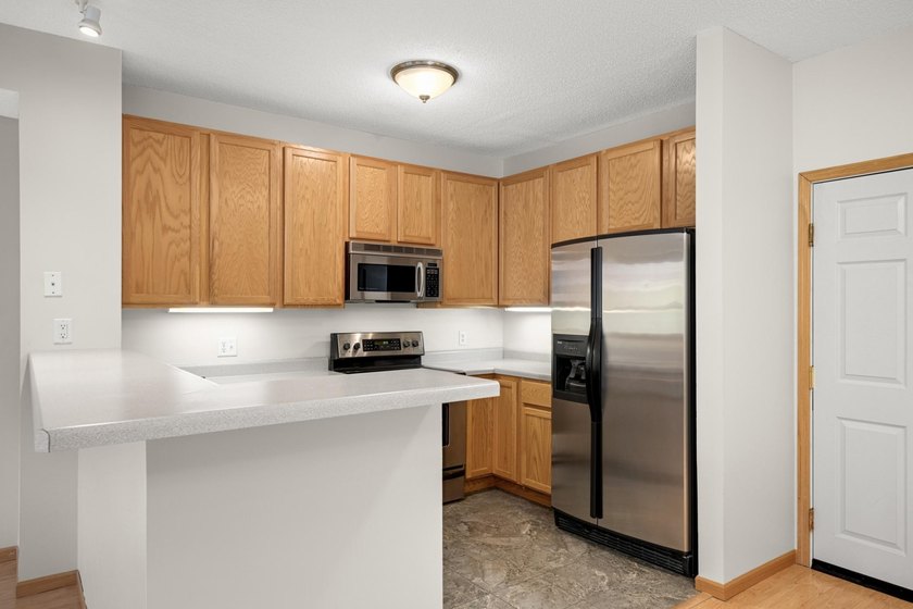 Rarely available corner unit at River Station Condos in the - photo 10