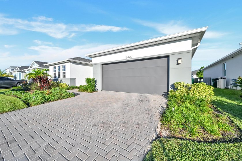 Welcome to this exceptional 4-bedroom, 3-bathroom single-family - photo 2